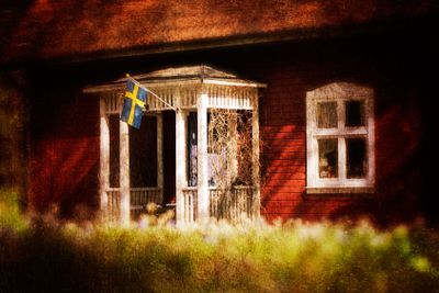 Old red wooden cottage in Sweden
