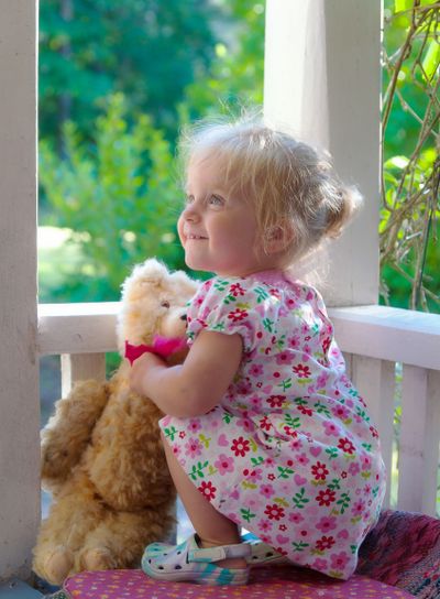 Cute little girl with teddy bear