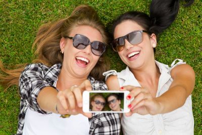 Best friends taking selfies