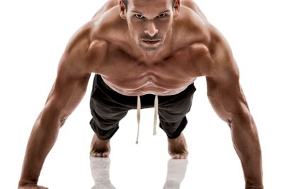 Muscle man making pushups