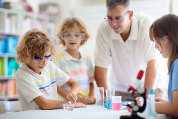 School science class. Students at chemistry lesson