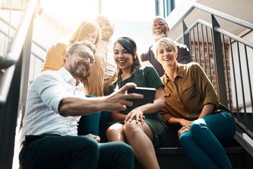 Team of the year selfie. Cropped shot of a group of...