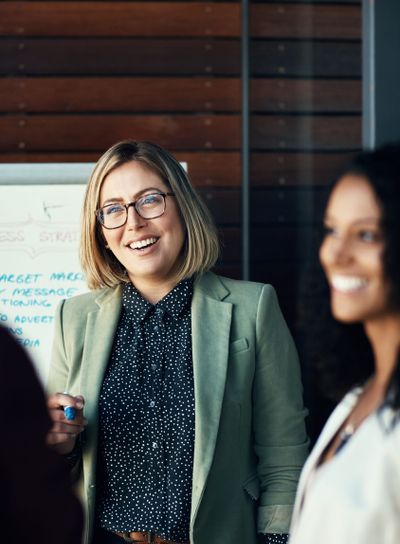 Woman, group and employees brainstorming, meeting and...