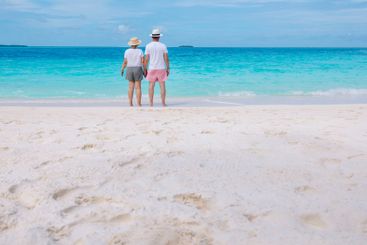 Close-up of young married couple in shorts and T-shirts